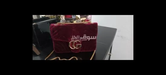 حقيبة يد مع خزام دهبي جديد